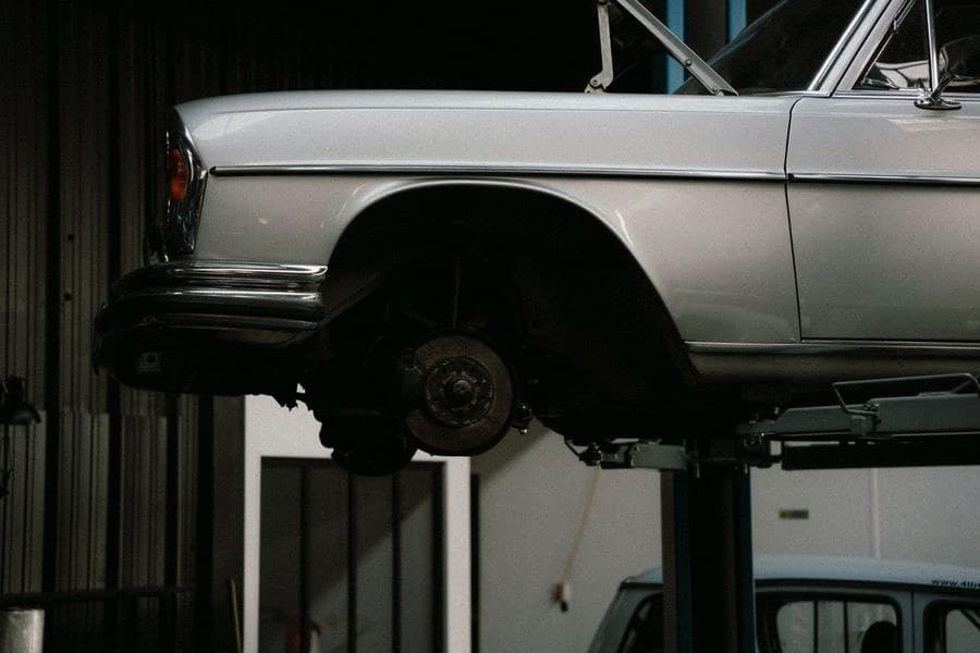 Classic car on the lift, ready for service